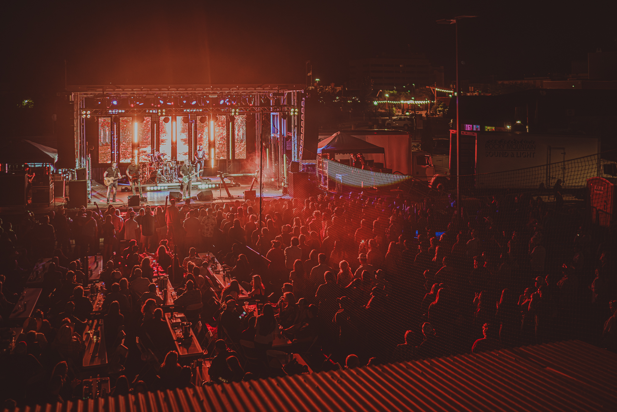 A live concert crowd facing The Gaslight Social stage