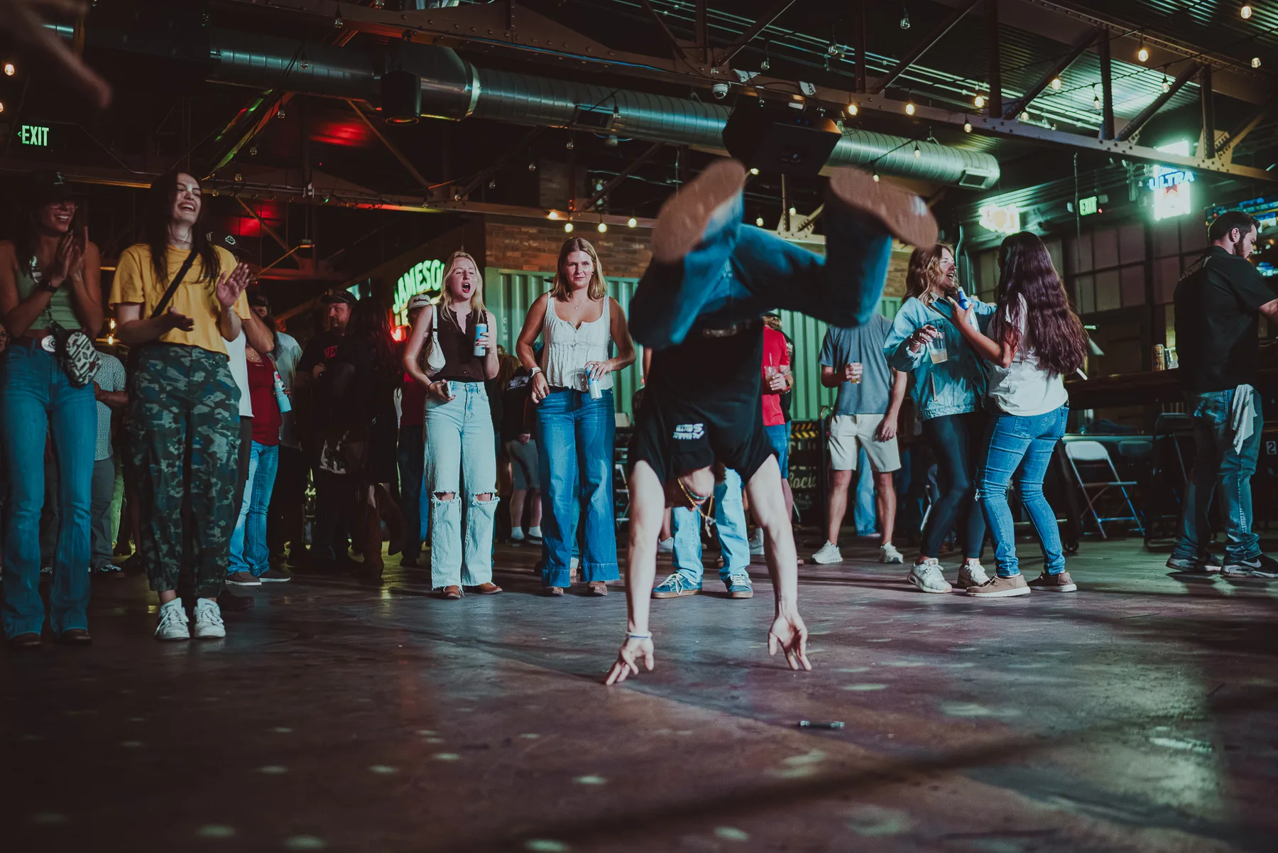 Guests gathered around a dance circle at The Gaslight Social